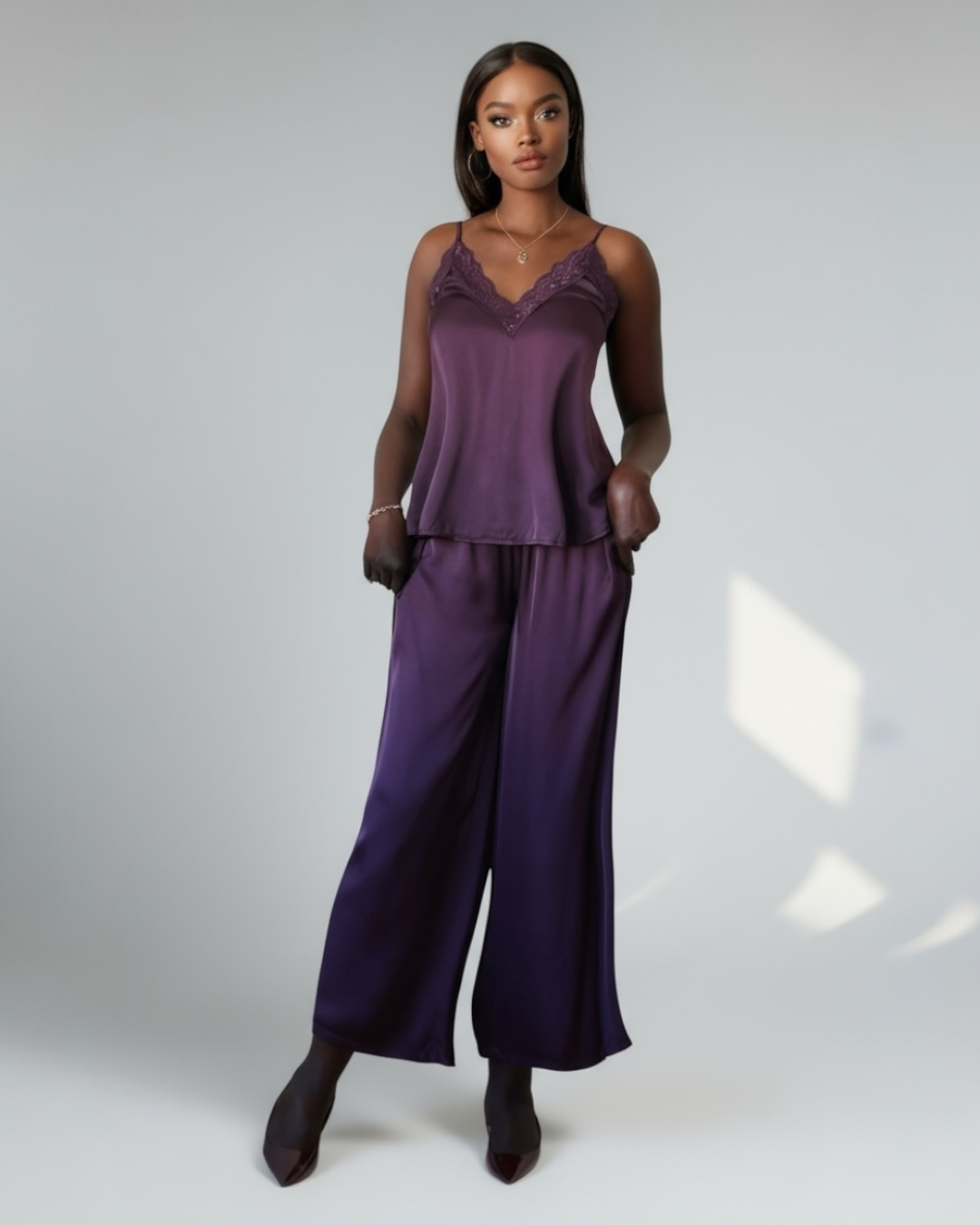 Фиолетовые брюки