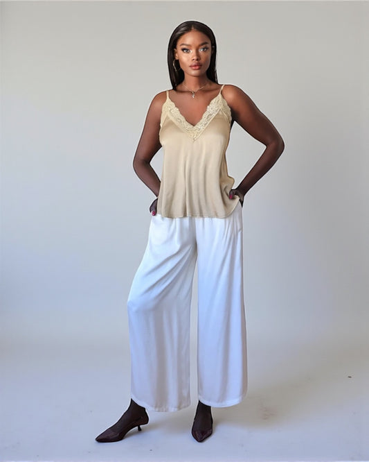 Брюки из белого золота